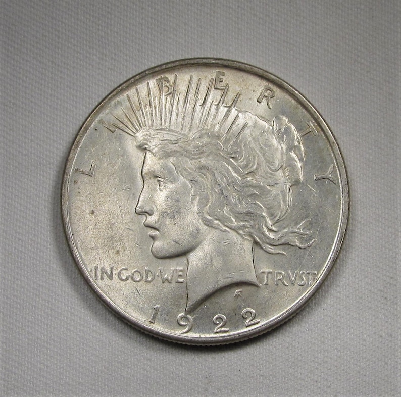 AU 1922 Peace Silver Dollar Almost Uncirculated