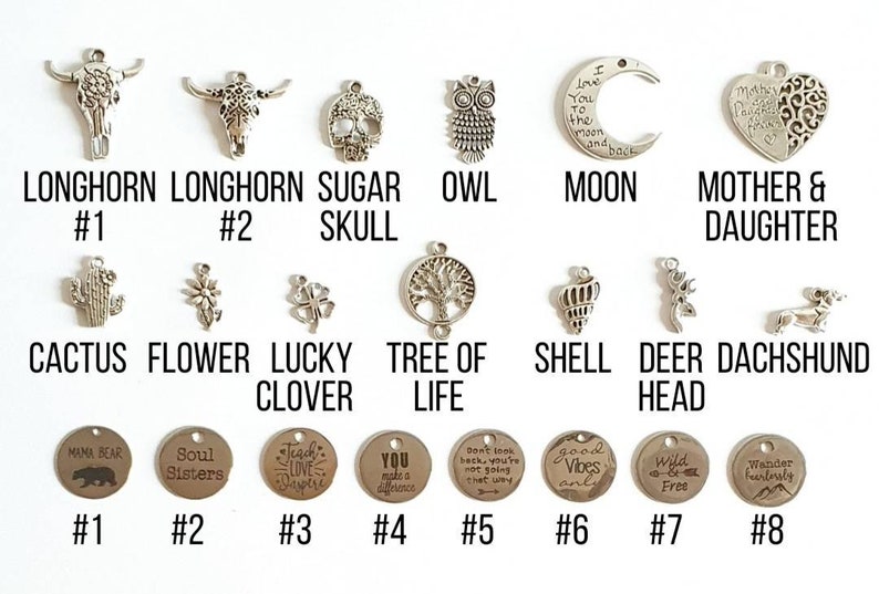 May include: Assortment of silver charm pendants with various designs, including a cactus, flower, lucky clover, tree of life, shell, deer head, dachshund, longhorn, skull, owl, moon, and mother and daughter heart.  Also included are eight round silver charms with various inspirational messages.