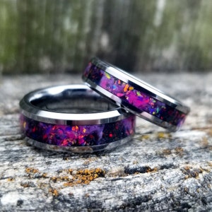 His and Hers wedding ring set. Tungsten glow ring with ruby opal and black fire opal inlay. fire opal ring. Galaxy ring. woman and mens ring