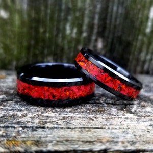 His and Hers Wedding Ring Set. Black Ceramic set with red fire opal and glowstone inlay. Fire opal rings. womans and mens ring. Sizes 5-13