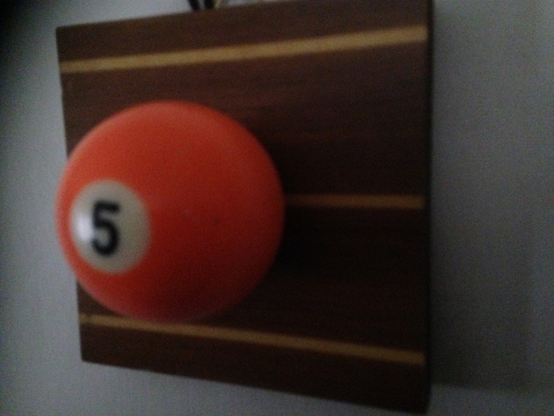 Single Billiard Ball coat hanger made from Etsy