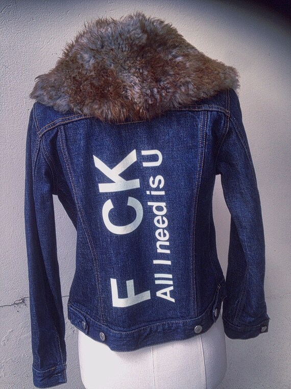 denim jacket with writing on back