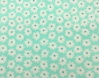 264 Flannel fabric blue with little white daisies sold by the yard