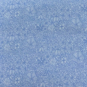 508 COTTON fabric light blue background with blue outlined flowers  sold by the yard.
