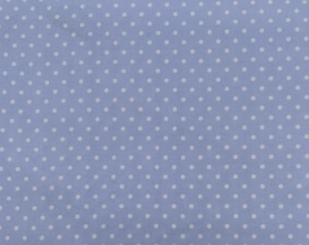1088 Flannel fabric cornflower blue background with white polka dots sold by the yard.