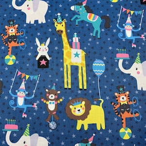 115 COTTON fabric blue with circus animals giraffes monkeys lions tigers bears horses elephants and stars sold by the yard.