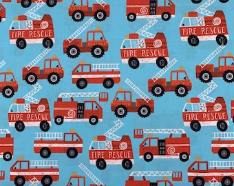 453 COTTON fabric aqua blue background with fire & rescue vehicles sold by the yard.