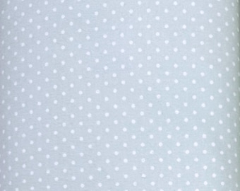 1309 Flannel fabric light seamist green with white dots sold by the yard.
