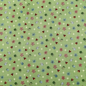 532 COTTON fabric green background with tossed flowers ladybugs snails sold by the yard.