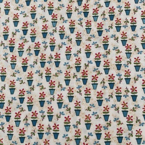 529 COTTON fabric ivory background with little blue flower pots & flowers sold by the yard.