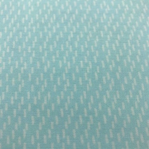 70 COTTON fabric light blue with white rain drops sold by the yard