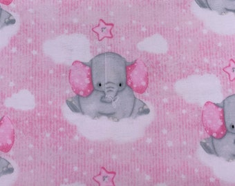 891 Flannel fabric pink background with gray elephants pink ears sitting on clouds holding pink star balloon sold by the yard.