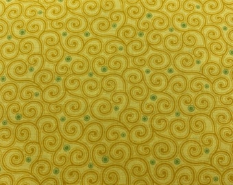 193 COTTON fabric yellow background with gold swirls and green dots sold by the yard.