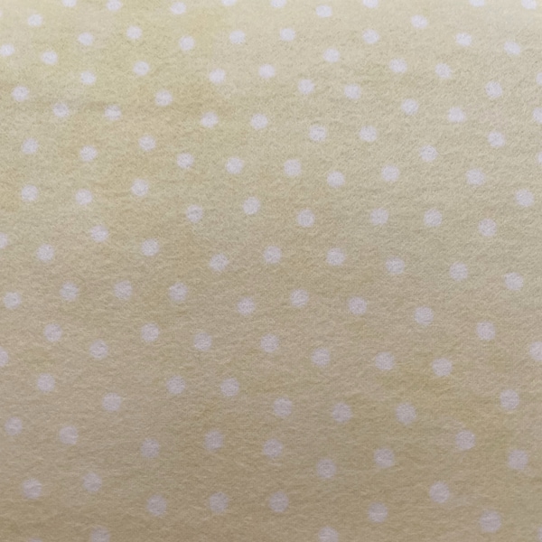 1085 Flannel fabric light pale fade in & out yellow with tonal white dots sold by the yard.