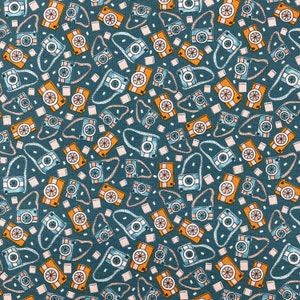666 COTTON fabric teal background with tossed aqua & peach cameras and film sold by the yard.