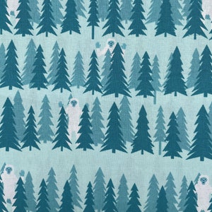 538 COTTON fabric light aqua with rows of aqua & tell trees with white Yeti hiding in trees sold by the yard.