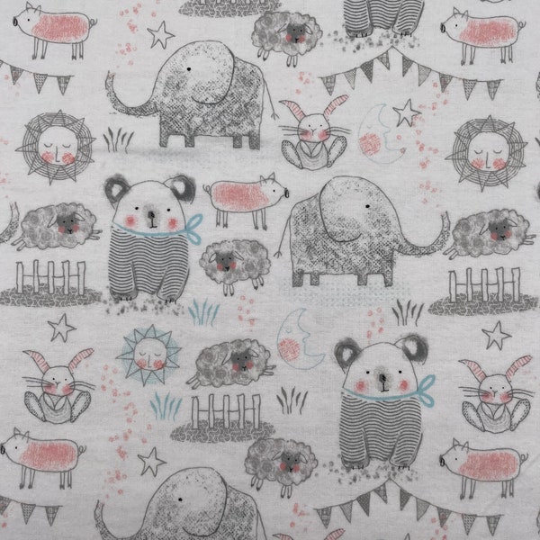 1055 Flannel fabric white background with black outlined grayed animals with mint & peach accents sold by the yard.