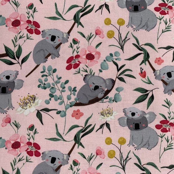 407 COTTON fabric light pink background with gray koalas on tree branches & pink and red flowers sold by the yard.