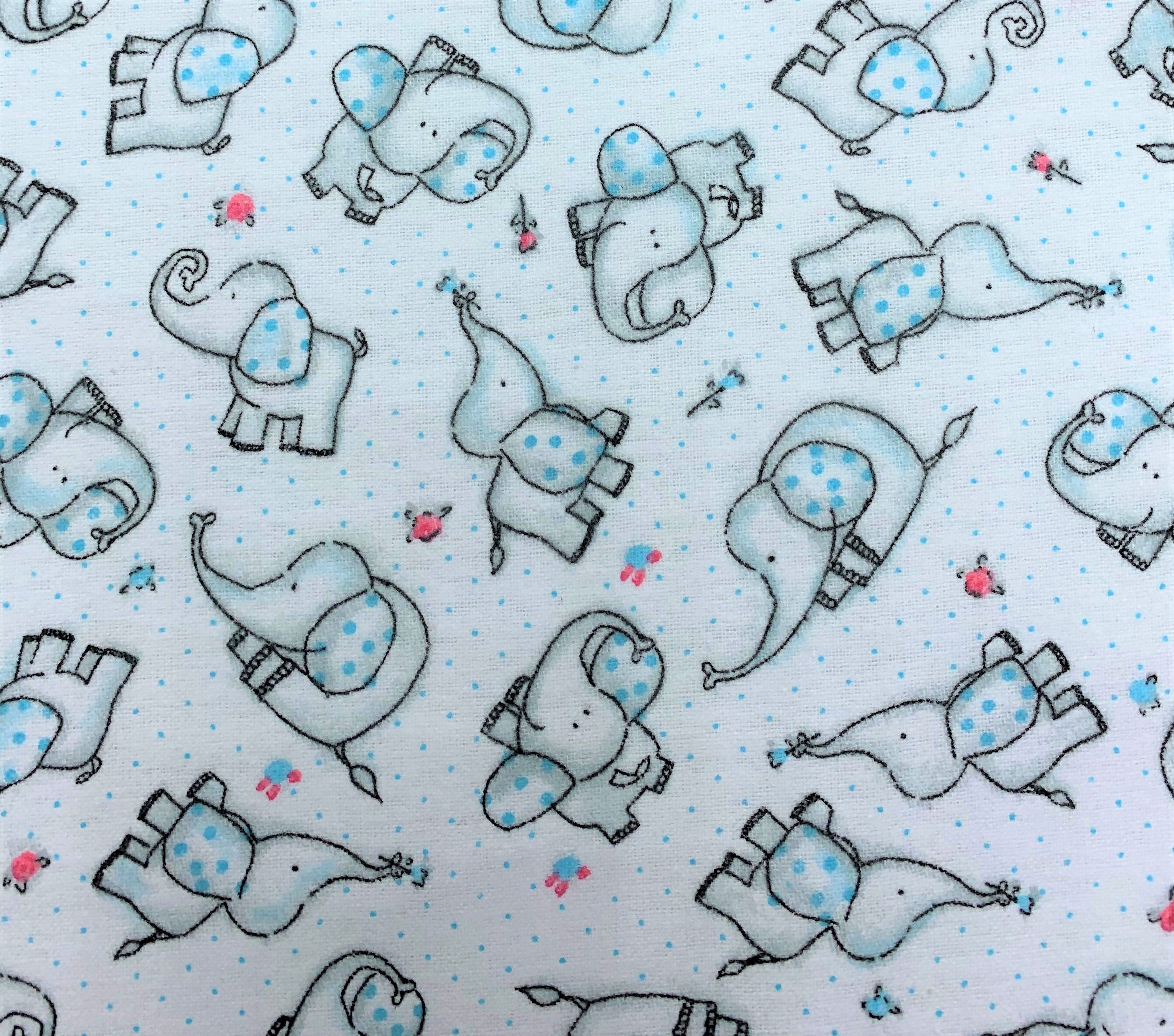 815 Flannel fabric white background blue tiny dots /& flowers with tossed gray elephants blue dots on ears sold by the yard.