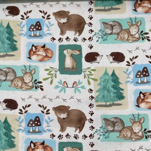 731 COTTON fabric patchwork squares with forest trees baby animals mushrooms leaves & footprints sold by the yard.