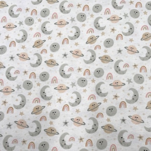 1164 Flannel fabric white with light pink gray brown crescent moons planets stars sold by the yard.