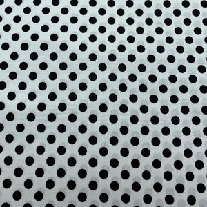 343 COTTON fabric white background with black polka dots sold by the yard.