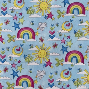 624 COTTON fabric blue background with rainbows sun shinning stars birds butterflies bees sold by the yard