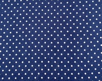 919 Flannel fabric navy blue background with white polka dots sold by the yard.