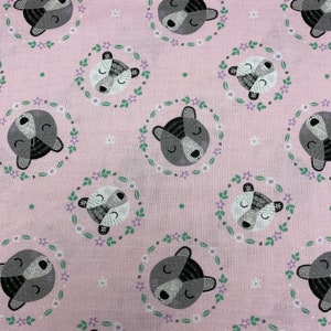 137 COTTON fabric pink with tossed bear faces framed with flowers sold by the yard.