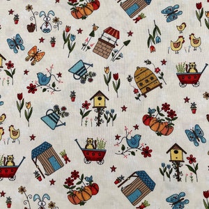 530 COTTON fabric ivory background with watering cans flowers birdhouses sold by the yard.