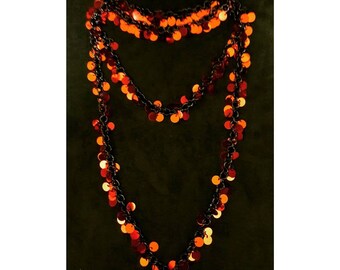 Red sequin necklace on black chain