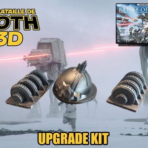 May include: An upgrade kit for the Star Wars: Battle of Hoth 3D board game, featuring miniature AT-AT walkers, a helmet, and other game pieces. The box art for the game is also visible. The text "UPGRADE KIT" is displayed.