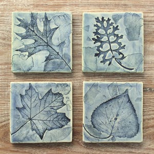 Set of four leaf impression tiles for coasters, kitchen or bathroom backsplashes, fireplace accent tiles