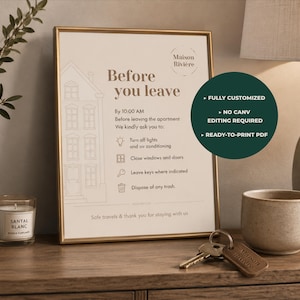 Può includere: Un cartello incorniciato intitolato Before you leave con istruzioni per gli ospiti, tra cui spegnere le luci, chiudere le finestre, lasciare le chiavi e smaltire i rifiuti. Il cartello presenta un disegno al tratto di una casa e il testo Maison Riviere.