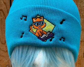 Orange tabby cat playing the piano nostalgia meme blue  Cuffed knit Beanie