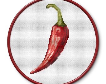 Può includere: Ricamo a punto croce di peperoncino rosso in un cerchio di legno rotondo.