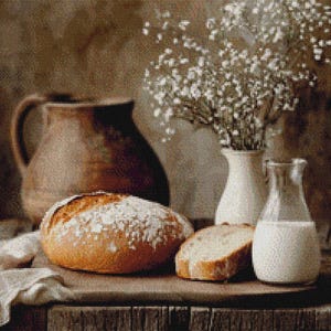May include: A still life featuring a rustic brown clay pitcher, a loaf of freshly baked bread, and two white ceramic pitchers filled with milk, all arranged on a wooden table with a white cloth. Delicate white flowers in a vase add a touch of elegance to the scene.