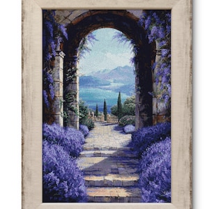 May include: A framed painting of a stone archway with a view of a lake and mountains in the distance. The archway is covered in purple flowers and vines. A stone path leads up to the archway.
