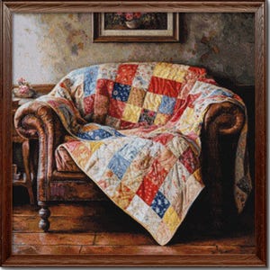 May include: A vintage-style armchair with a patchwork quilt draped over it. The quilt is made of various colors and patterns, including red, blue, yellow, and white. The armchair is brown leather with wooden legs and arms. The background is a faded, textured wall.