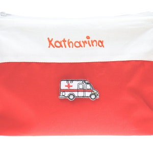 Toiletry bag 21 x 16 cm red - white with name and application ambulance for the travel first aid kit