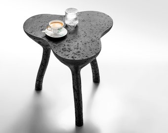 Black sculptural coffee table, accent furniture