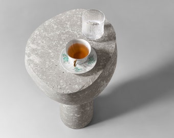 Concrete sculptural side table