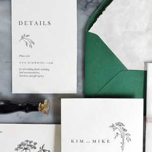 May include: Wedding invitation with a green envelope and a white card with the text "KIM and MIKE" and a floral illustration. The text below the names reads "invite you to join them for their wedding weekend in the Catskills August 9 - August 11, 2019 THE NORTH BRANCH INN North Branch, New York"