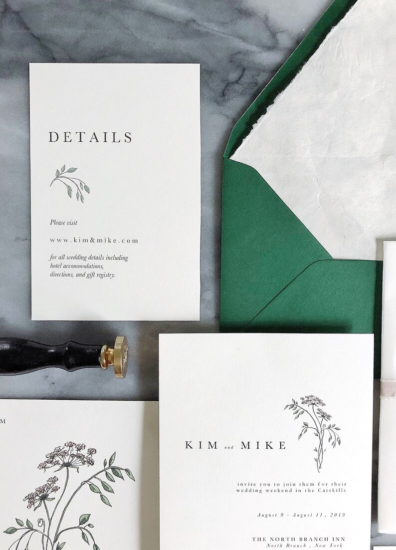 May include: Wedding invitation with a green envelope and a white card with the text "KIM and MIKE" and a floral illustration. The text below the names reads "invite you to join them for their wedding weekend in the Catskills August 9 - August 11, 2019 THE NORTH BRANCH INN North Branch, New York"