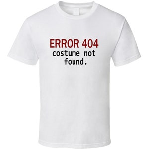 May include: White t-shirt with the text "ERROR 404 costume not found" in red and black. The shirt is a crew neck style, suitable for casual wear.