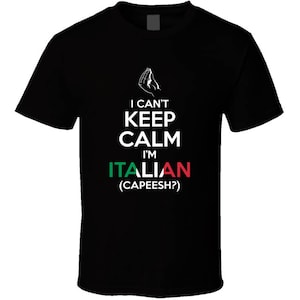 May include: Black t-shirt with a white graphic that says "I can't keep calm I'm Italian (capeesh?)" with a green, white, and red color scheme.