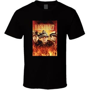 May include: Black t-shirt featuring a movie poster design for the film "Backdraft." The poster shows three firefighters in helmets against a backdrop of flames. The movie title is displayed in red and gold.