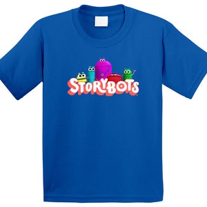 May include: A royal blue t-shirt with a colorful graphic of the StoryBots characters and the text "StoryBots".