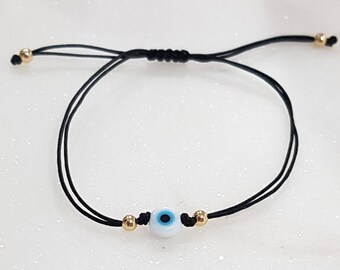 Evil eye protection bracelet with 14k gold beads