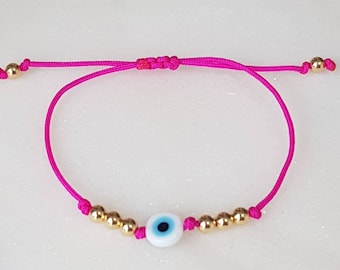 Evil eye protection baby bracelet with 14k solid gold beads